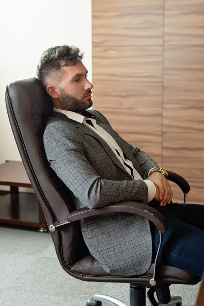 A Person Sitting on the Office Chair