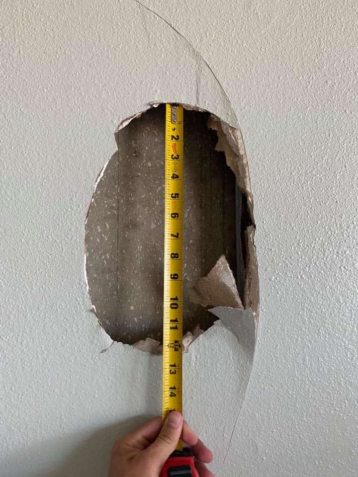 Gently cut the drywall to avoid making bigger holes that are unpatchable